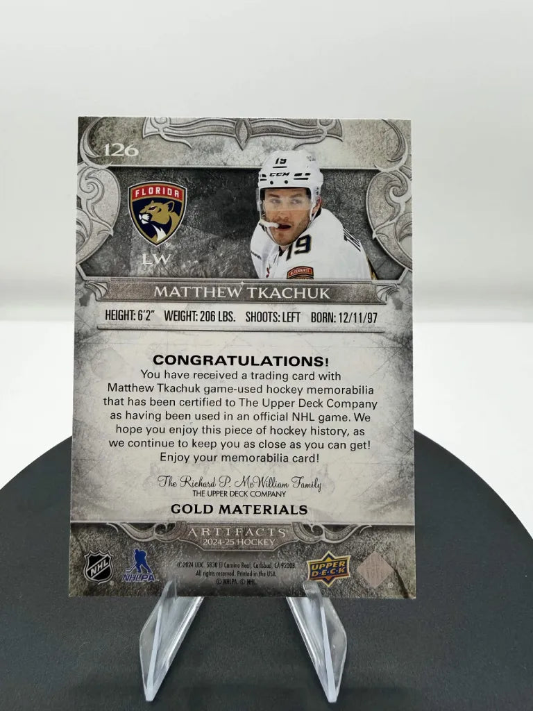 Matthew Tkachuk Gold Materials Jersey /199 2024-25 Upper Deck Artifacts #126